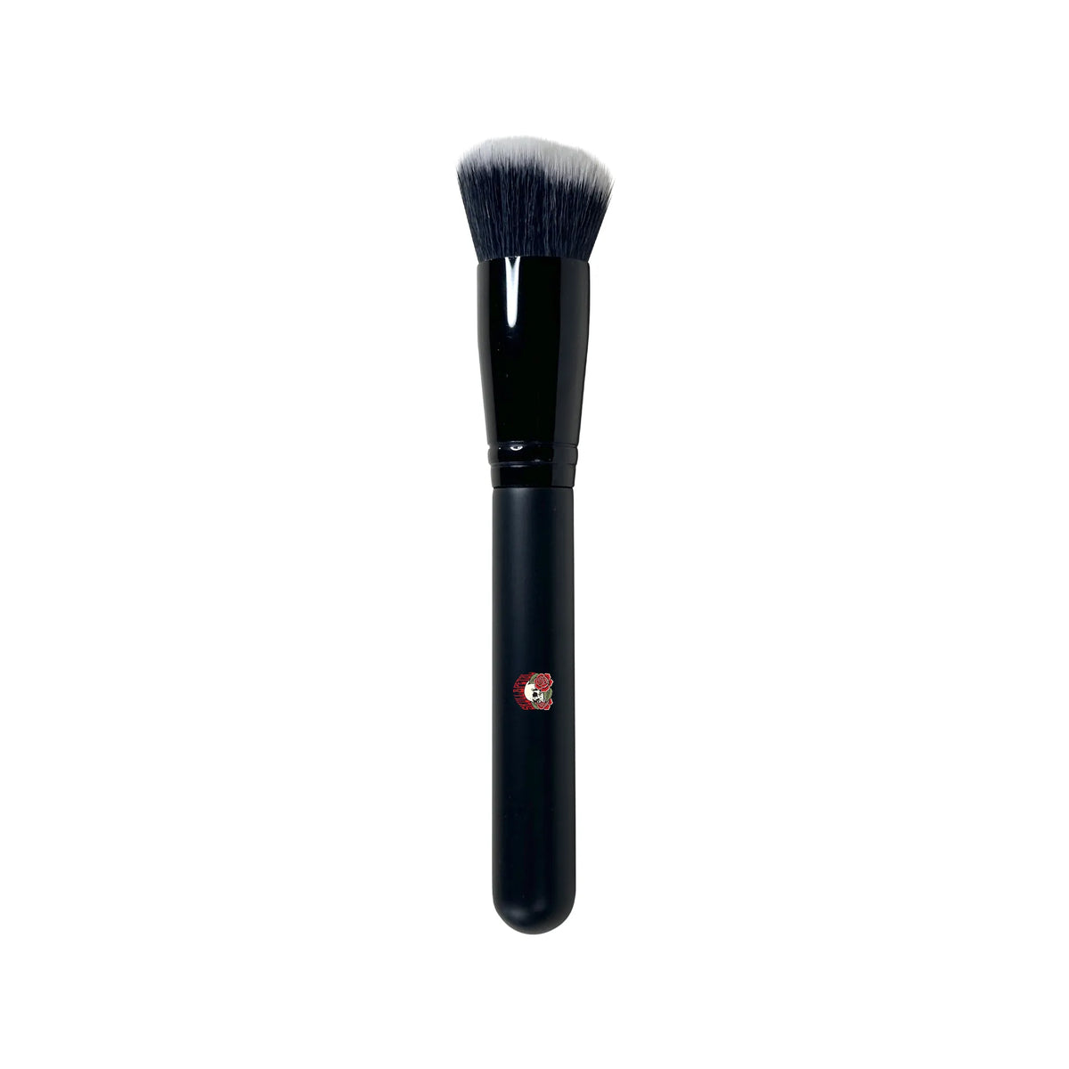 Foundation brush with Skull & Petal logo on it