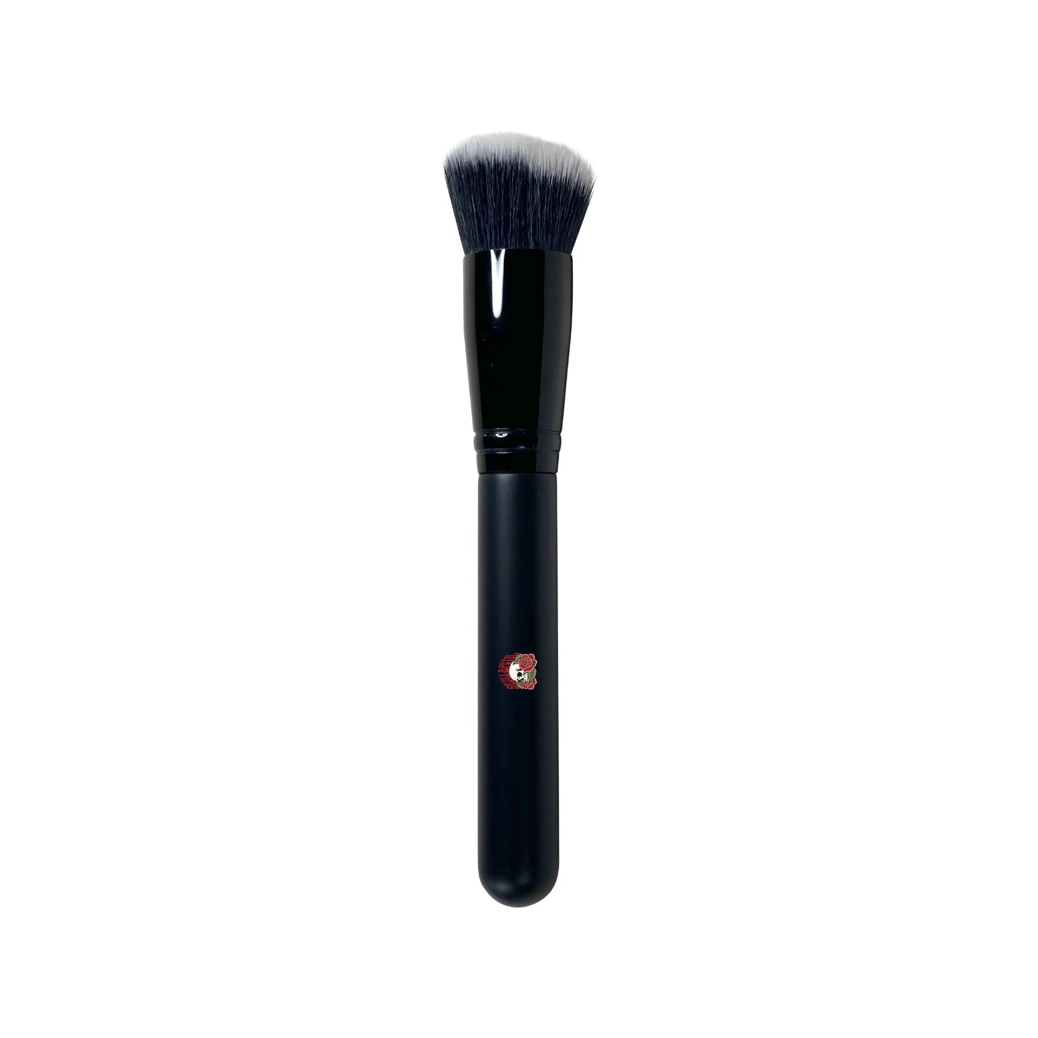Foundation brush with Skull & Petal logo on it