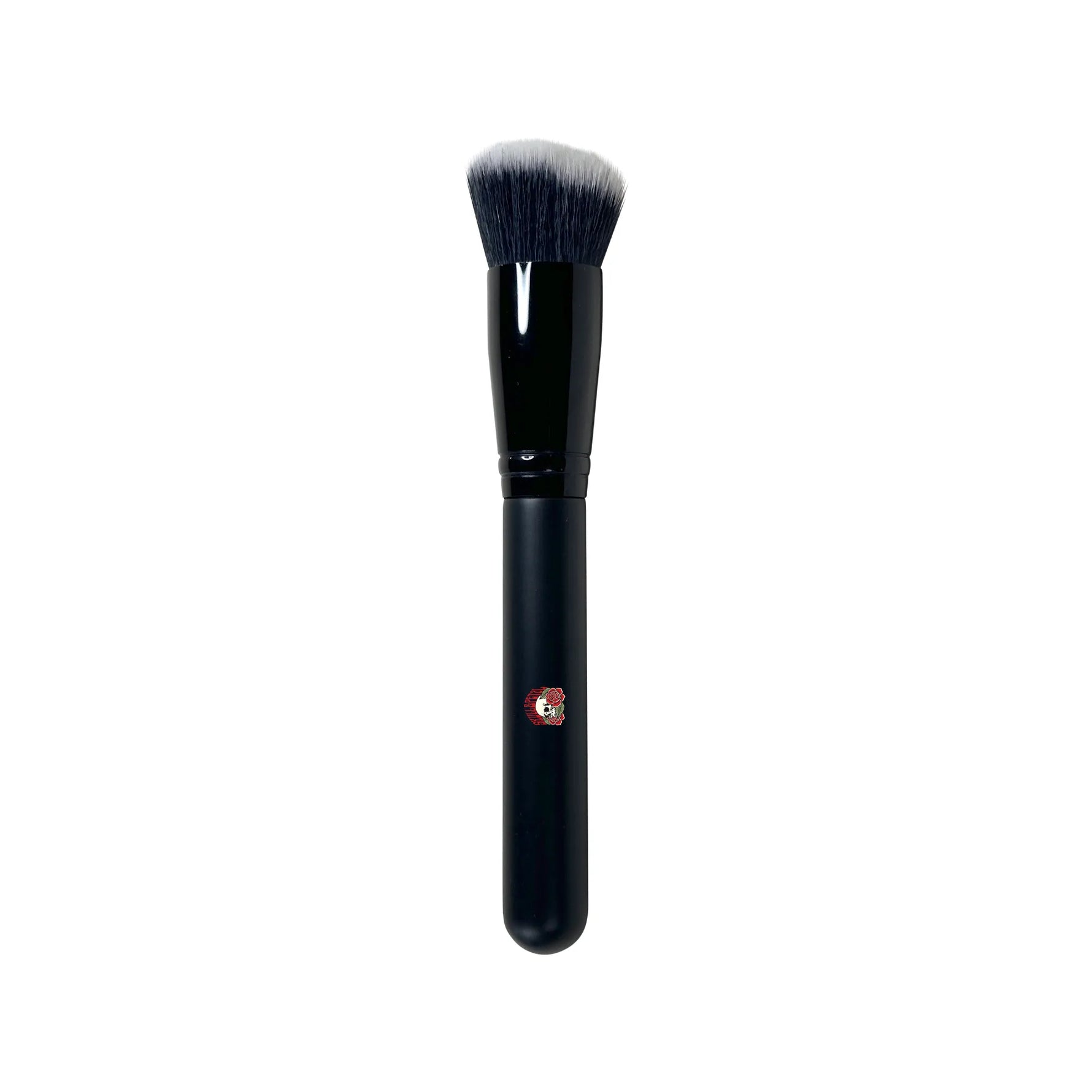 Foundation brush with Skull & Petal logo on it